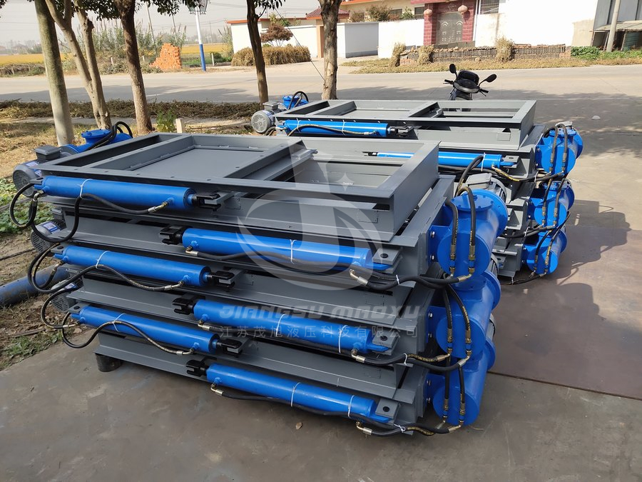 电液动平板闸门结构形式为液动扇形闸门，操作简便